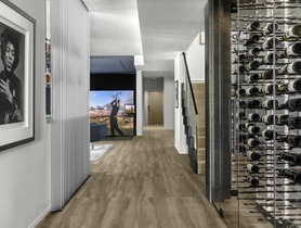 Lower Level Golf Simulator.  Crestron lighting control, audio and video distribution, commercial grade network