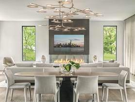 OLED TV with recessed articulating mount in back box. Invisible Speakers in ceiling