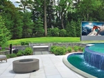 Stunning Stealth Patio Theater 190” outdoor LED TV with sound bar.