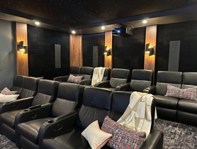 In this custom theater we designed in a unique acoustic treatment to compliment the audio and design.