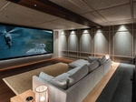 The room’s 9.4.6 Elementi setup delivers 3D sound, driven by the StormAudio EVO 20 processor.