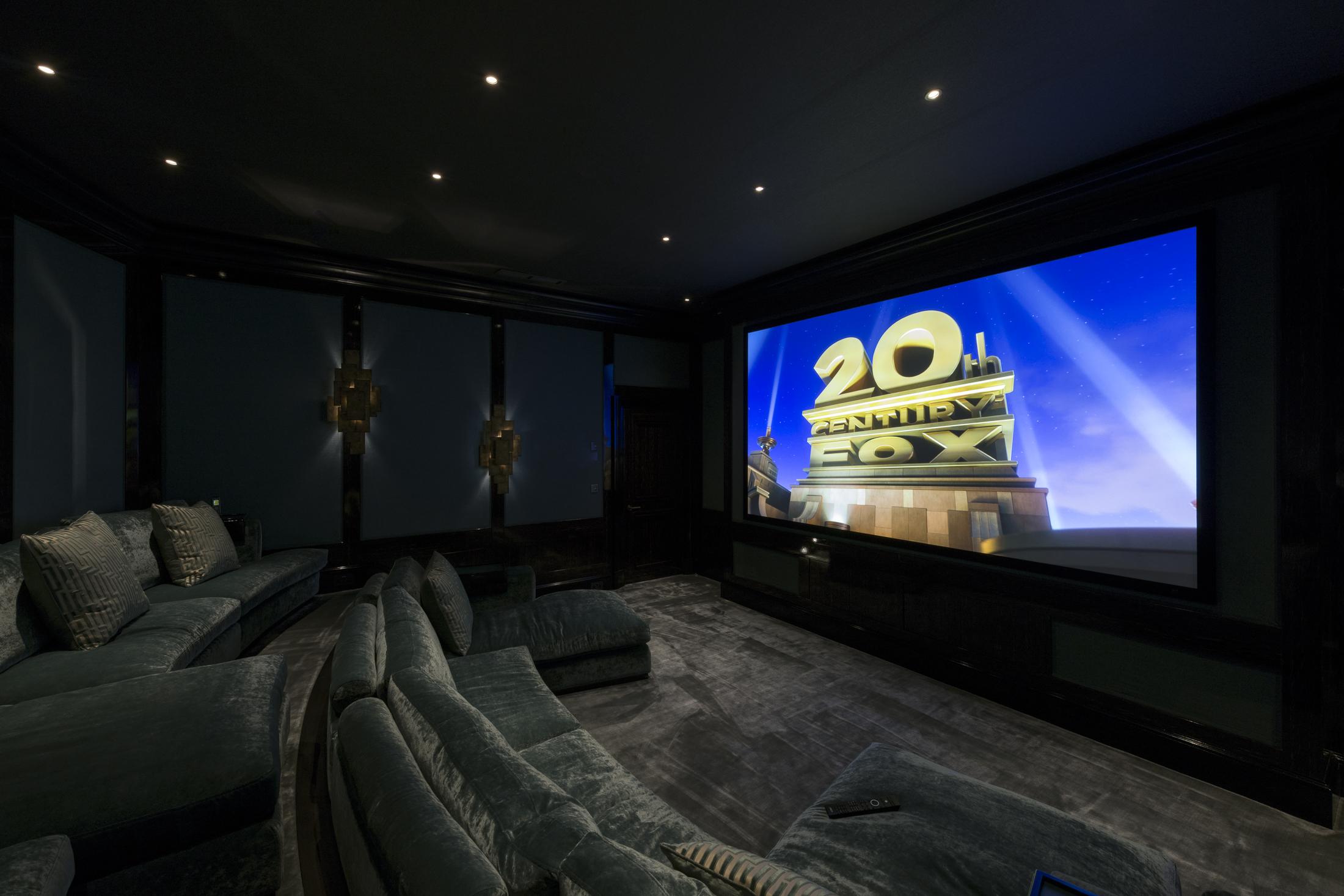 Clever Association Home cinema with Digital Projection projection, Triad loudspeakers and Classé processing and amplification.