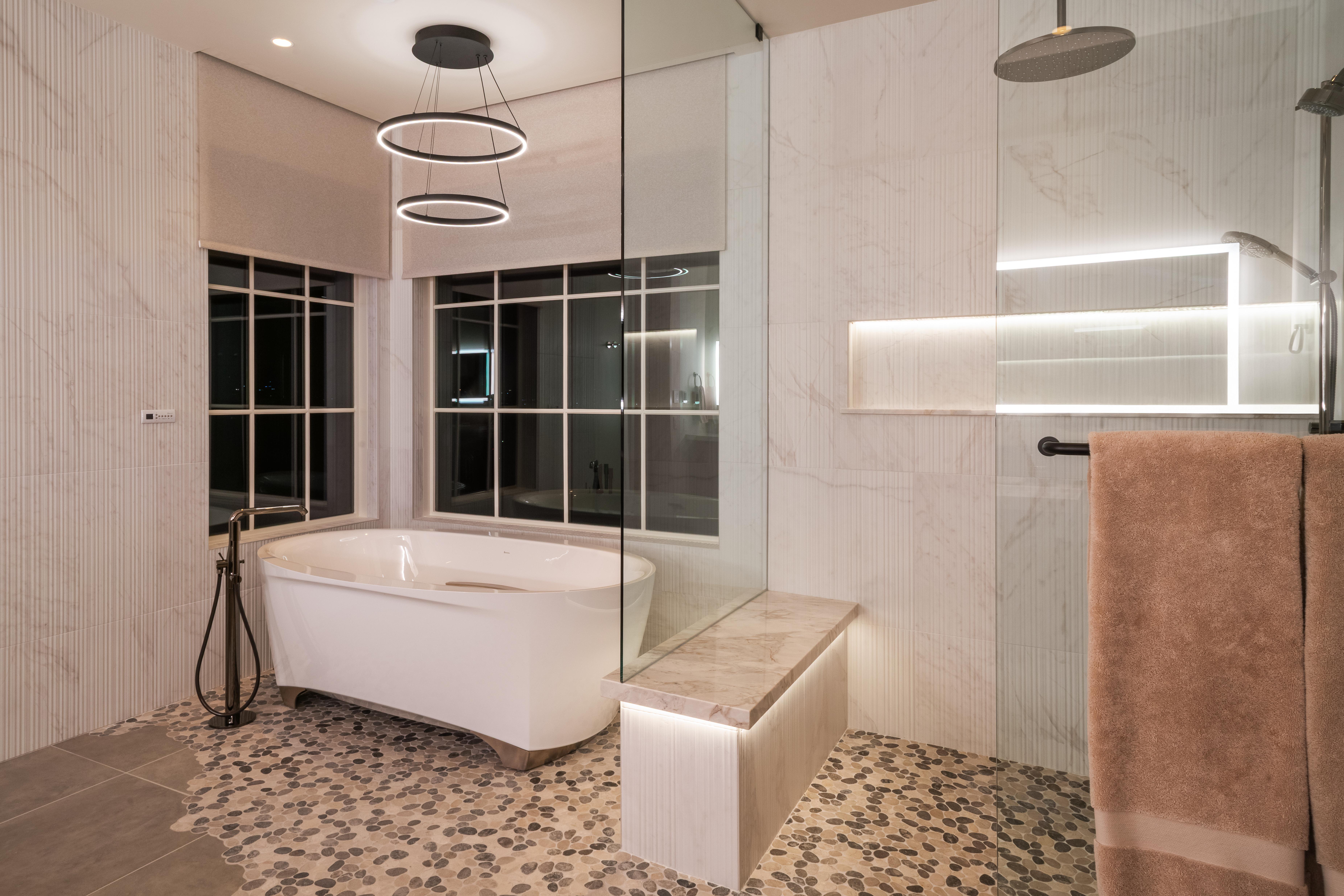 Logic Integration Primary bath with Lumaris linear lights, Ketra downlights, Lutron shades—all controlled by Josh.ai.