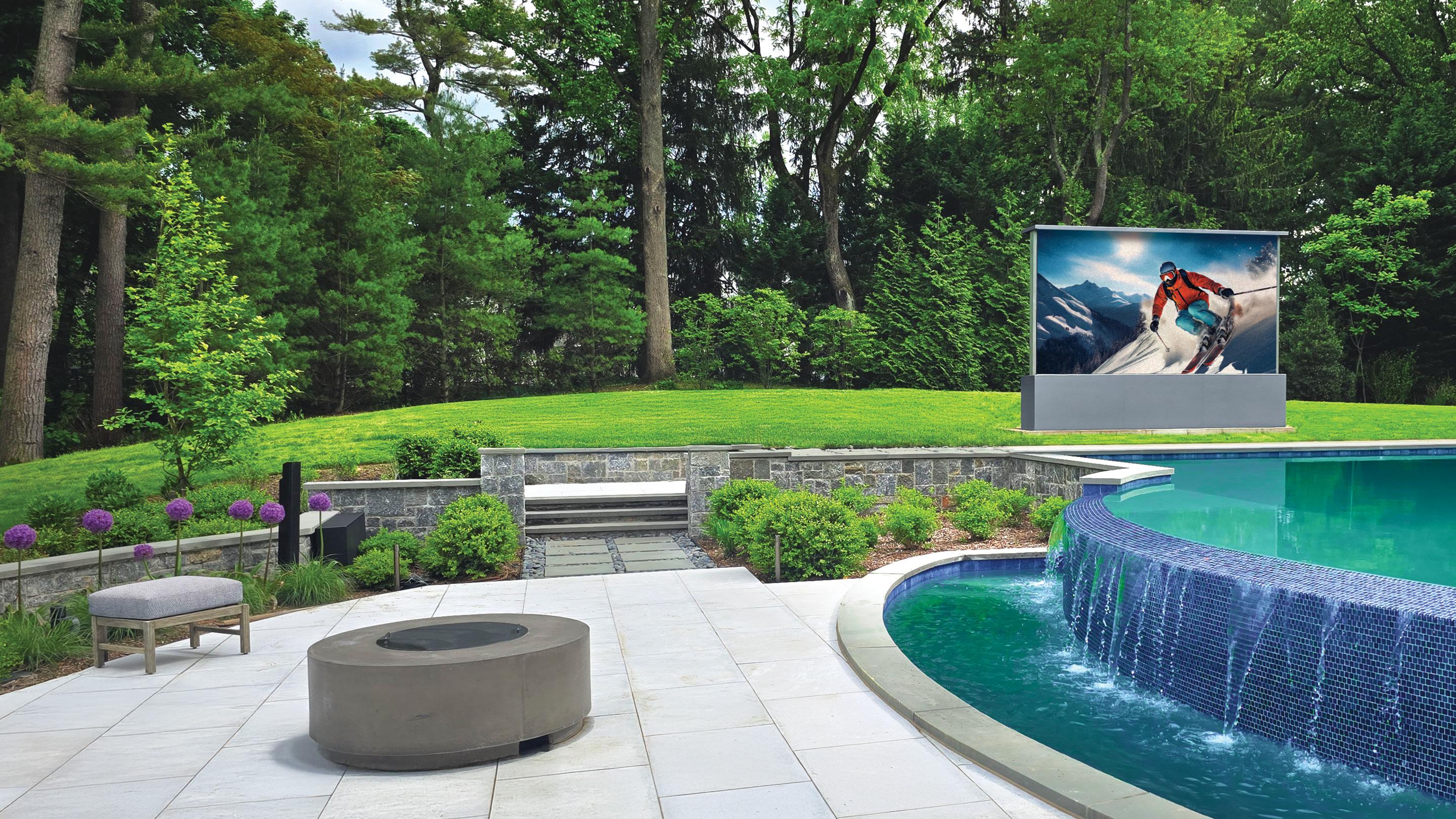 Stealth Acoustics Stunning Stealth Patio Theater 190” outdoor LED TV with sound bar.